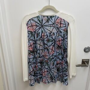 Stunning top with floral pleated back, v-neck